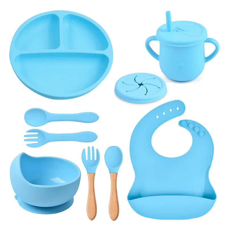 Set repas bébé 9 pièces – Assiette sourire, bol, tasse, bavoir, cuillère et fourchette bois | Silicone sans BPA
