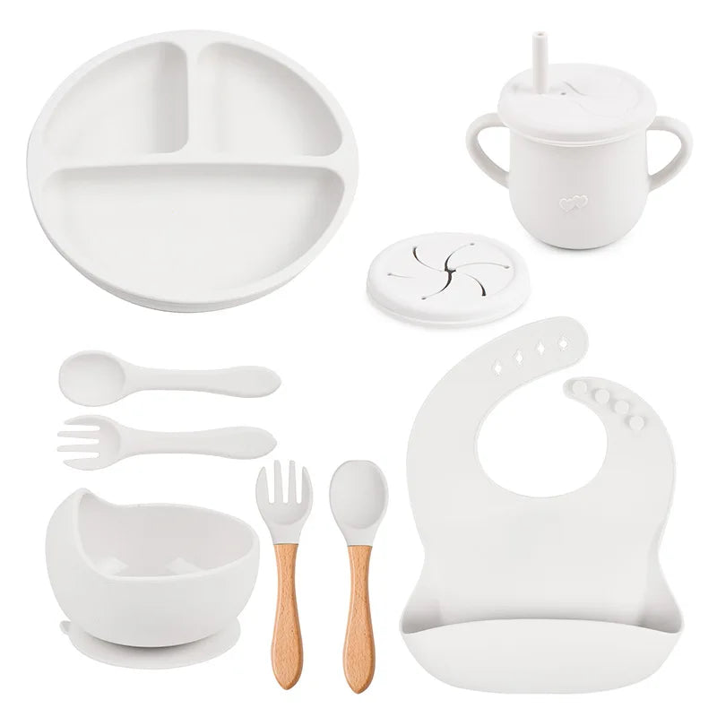 Set repas bébé 9 pièces – Assiette sourire, bol, tasse, bavoir, cuillère et fourchette bois | Silicone sans BPA