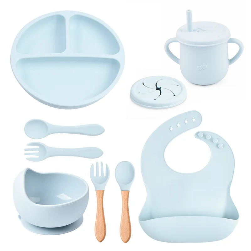 Set repas bébé 9 pièces – Assiette sourire, bol, tasse, bavoir, cuillère et fourchette bois | Silicone sans BPA